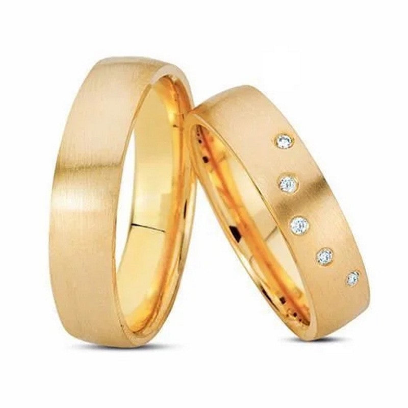 Flotte Nuran vielsesringe i 8 eller 14 karat guld med 5 x 0,01 ct diamanter